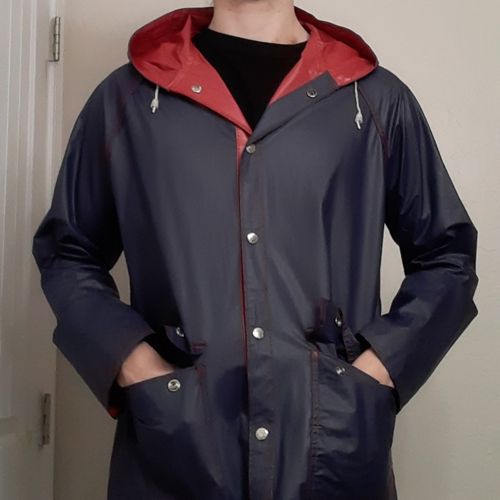 Reversible red and navy blue rain jacket